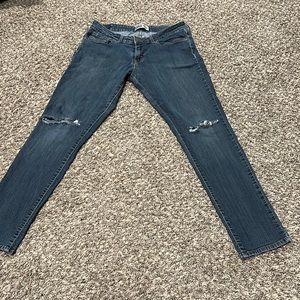 Levi mid rise skinny distressed knees size 12